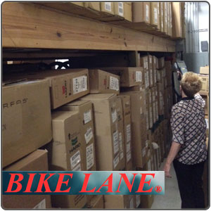Bike Lane employee using a Zebra MC919Z w/ TracerPlus Geiger loaded to Locate Inventory.